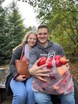 Jamey and her husband laughing and smiling