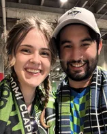 Two people smiling