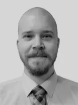 headshot of Mark in a shirt and tie