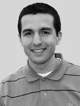 headshot of smiling man